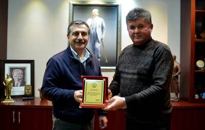 BAŞKAN ATAÇ'A IŞIKSPOR'DAN PLAKET